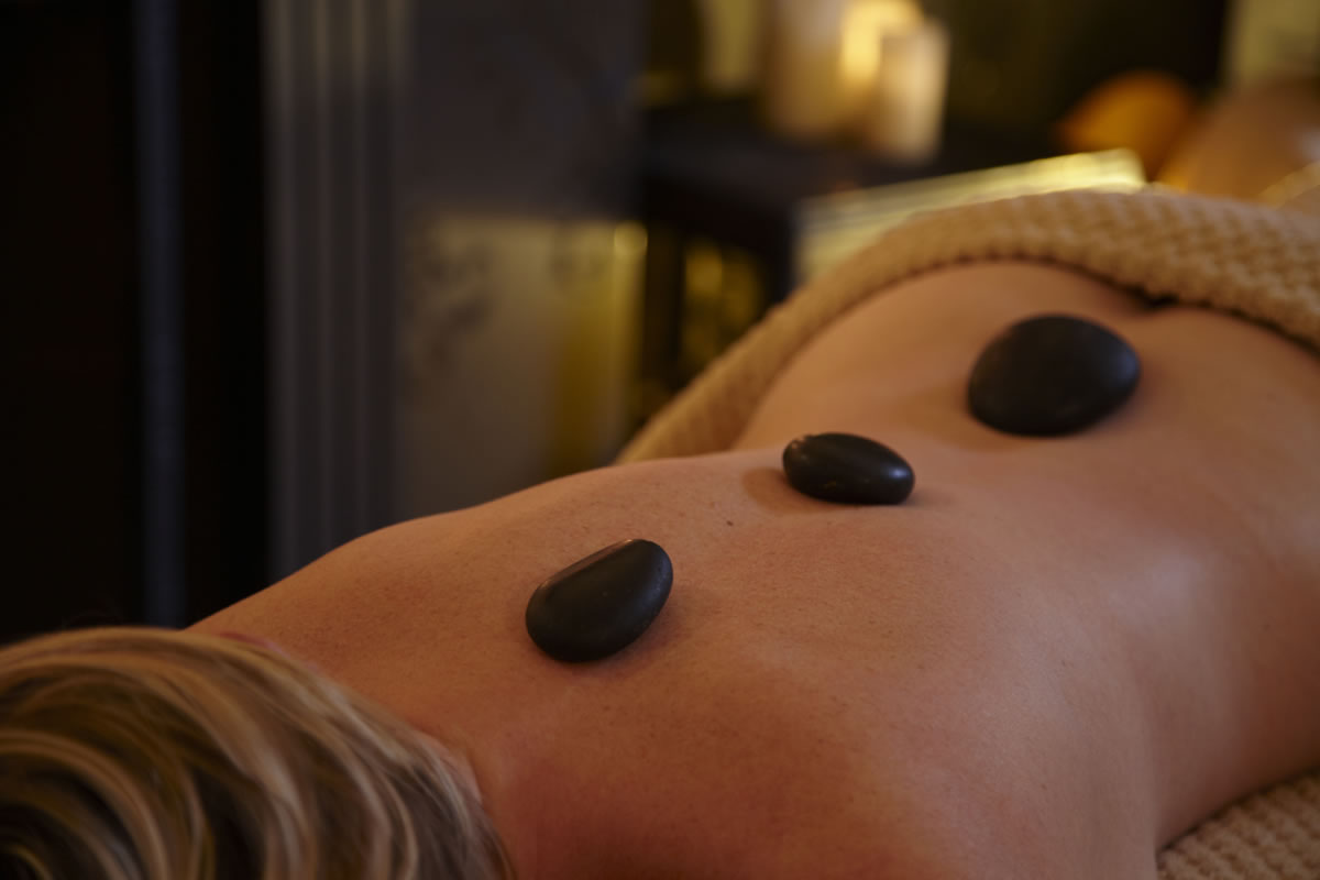 Feel the warmth of a Hot Stone Massage